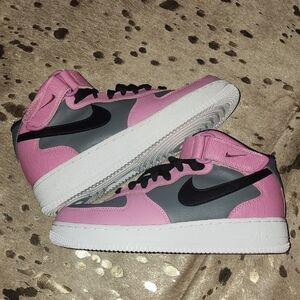 Nike Pink and Gray Athletic Shoes with High-Top Design